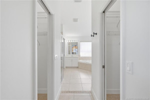 His and hers closets in the primary suite.