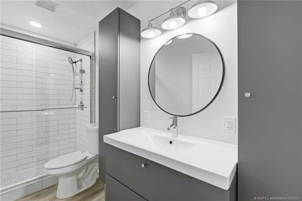 Guest bathroom: nicely updated with walk-in shower