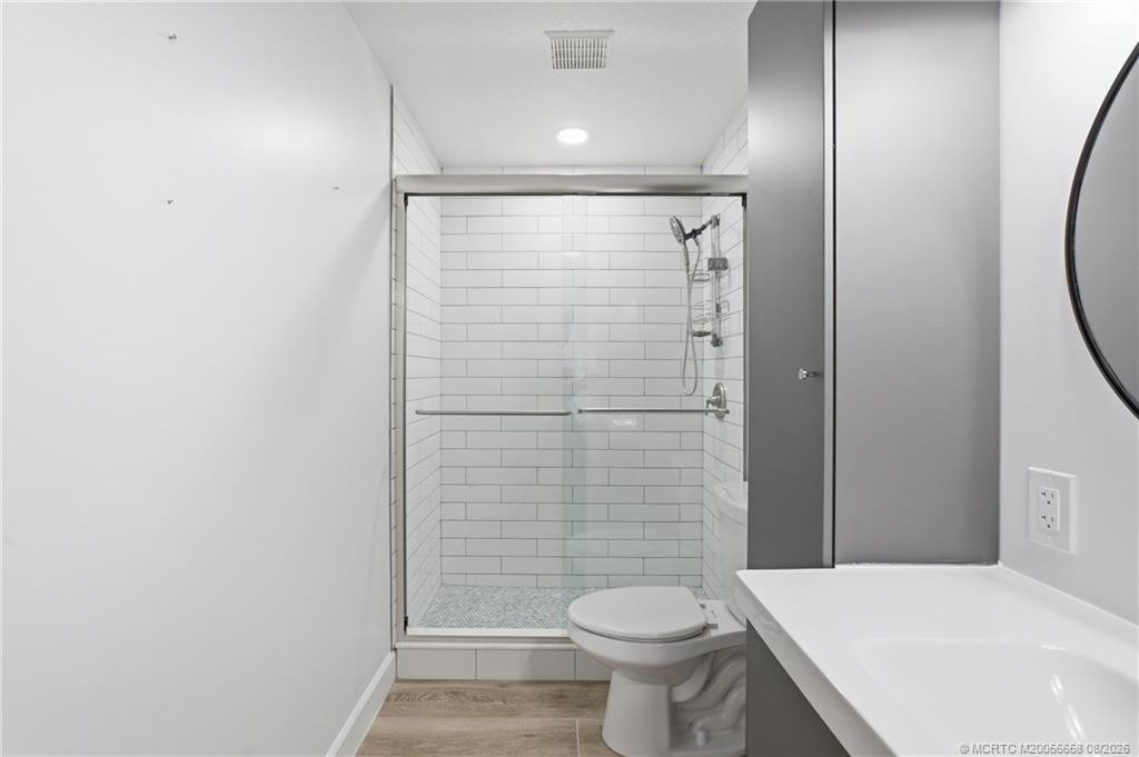 Guest bathroom: nicely updated with walk-in shower