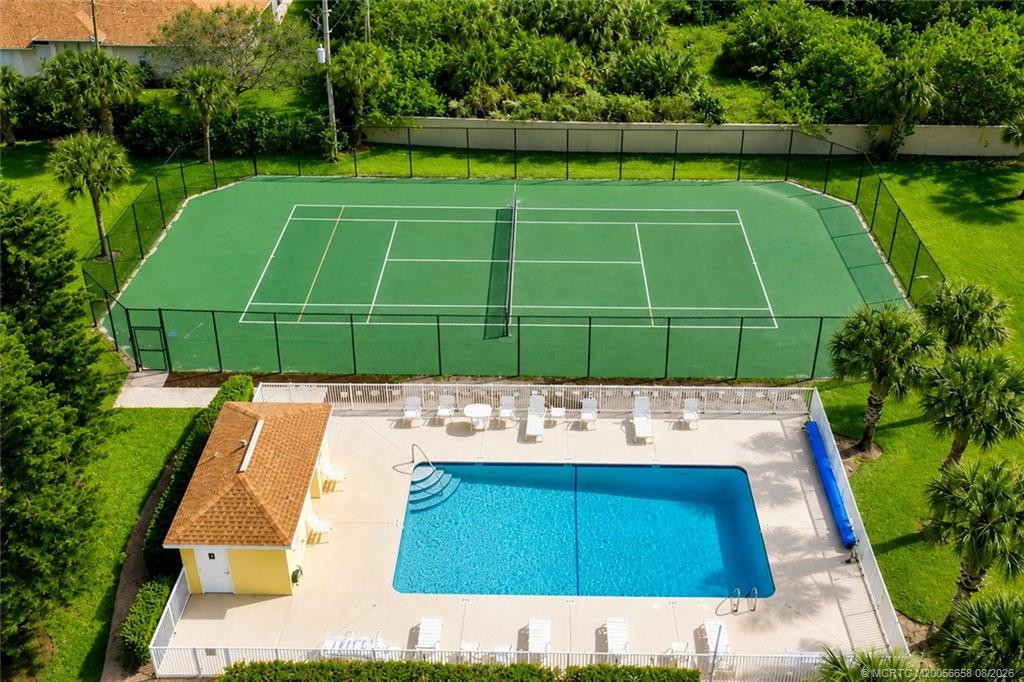 Community pool and tennis court at The Sands.