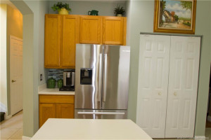 Newer stainless steel appliances round out this great kitchen space. A large storage pantry holds all of your dry goods