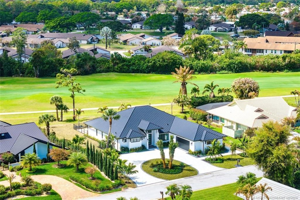 4 bedroom Single Family Residence at 5101 SE Burning Tree Circle, Mariner Sands 01, Stuart — photo 2