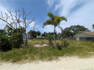 Far Left frontage. Water & Sewer access