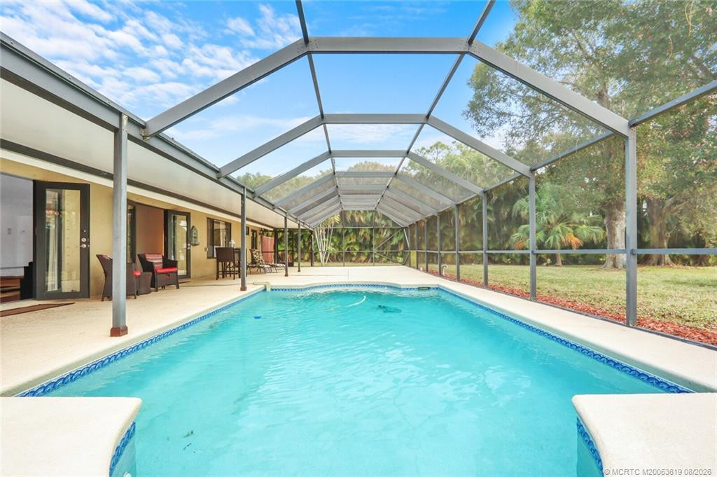 Inground Pool with Screened Enclosure at 3060 SE Darien Road, Port St. Lucie
