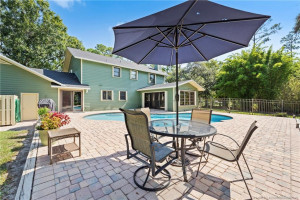 Pool with large paver patio.