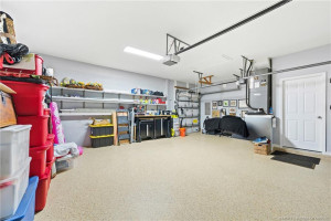 Large garage with side-load golf cart access