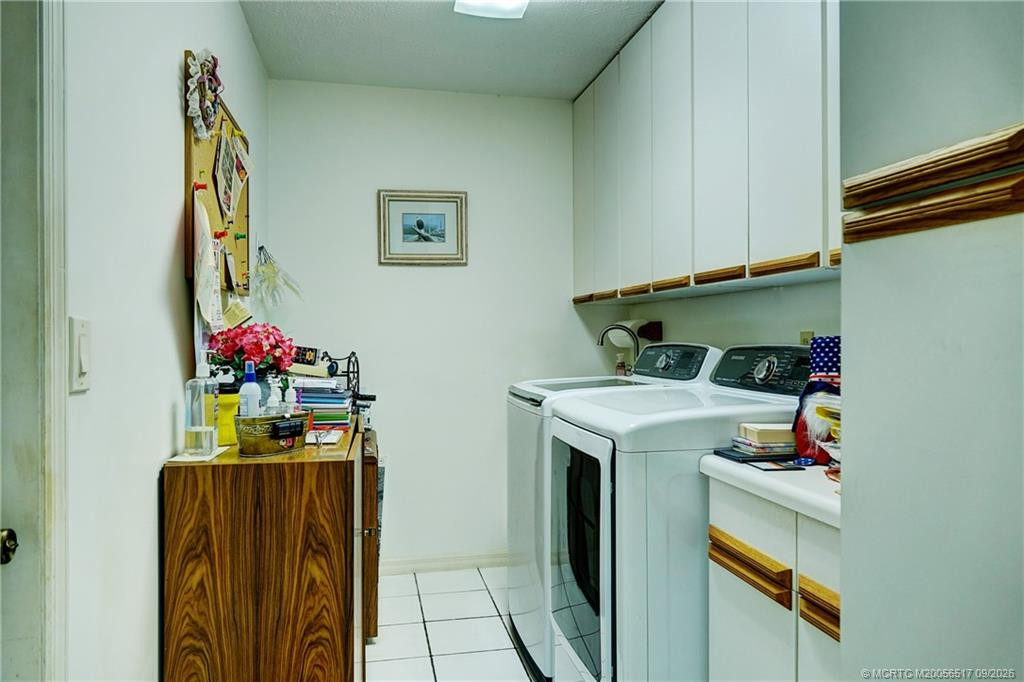Pantry with washer/dryer and laundry sink