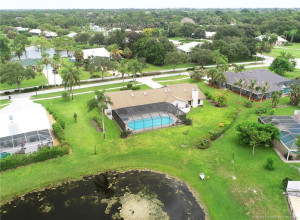 Rear exterior of house with lake view