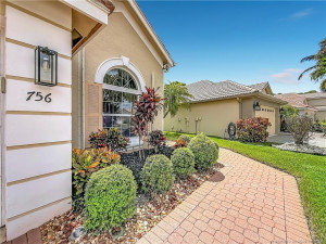 PAVERS TO THE FRONT DOOR ON THE RIGHTSIDE OF THE HOME.