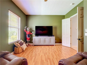 THIS IS USED AS THE TV ROOM FOR THEM CAN BE A BEDROOM WITH A CLOSET ADDED ANDOR A DEN.
