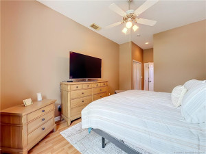 GUEST BEDROOM WITH FAN WITH JACK AND JILL BATHROOM. 14X11