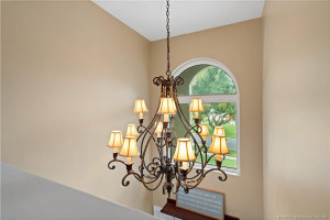 Chandelier above entrance foyer as seen from second floor