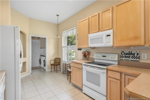Kitchen toward laundry