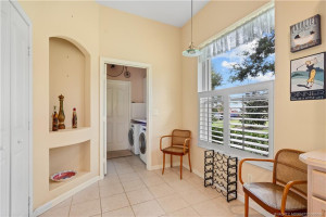 Kitchen to large window toward laundry