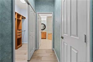 Primary Bedroom Hallway leading into Bathroom