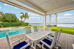 Covered Patio w/ Waterfront View & Pool/Spa