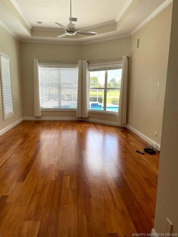 Master bedroom with beautiful laminate wood floor