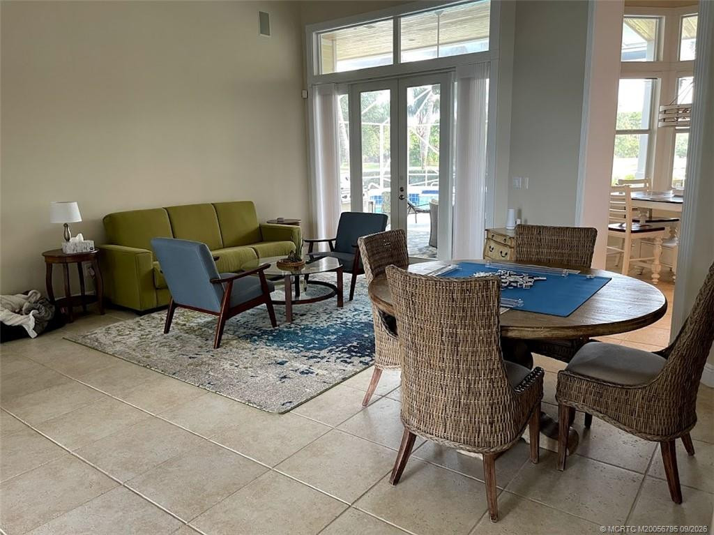 Living room looking over patio and pool