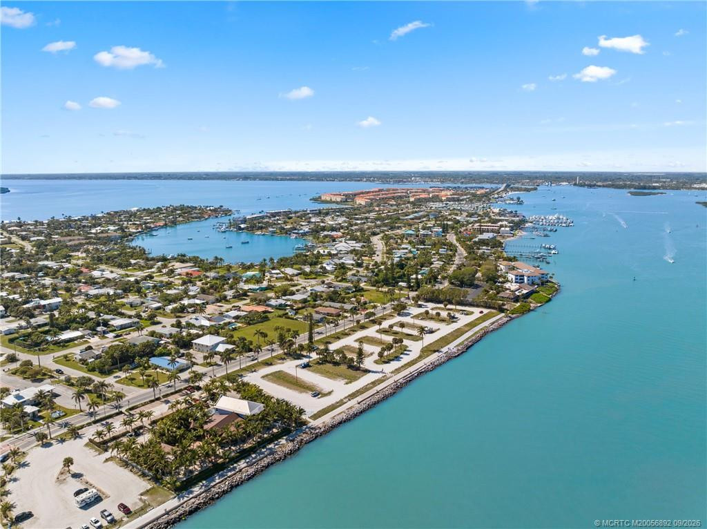 Aerial view highlights the waterfront setting and surrounding Fort Pierce and Hutchinson Island area.