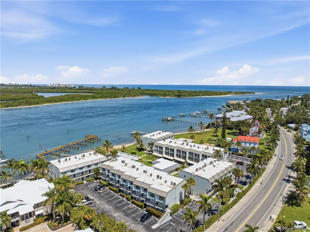Aerial view highlights the waterfront community and its proximity to the Fort Pierce Inlet and Atlantic Ocean.