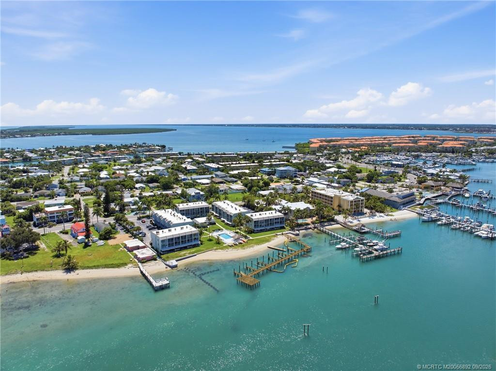 Aerial view captures the community’s waterfront setting with nearby marinas, docks, and easy access to the Intracoastal and Fort Pierce Inlet.