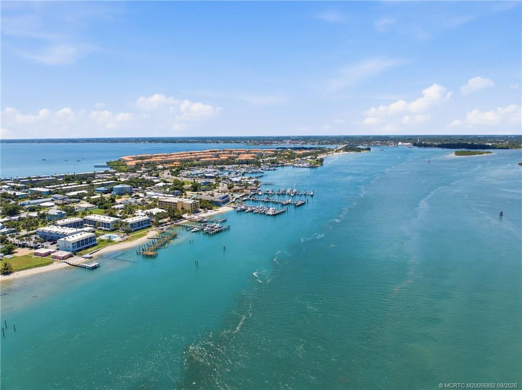 Sweeping aerial view of the community, neighboring marinas, and expansive Intracoastal Waterway.