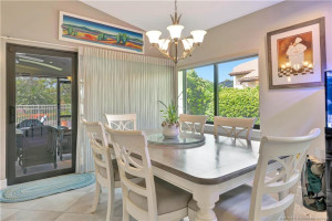 Open concept dining in kitchen/ den area