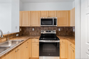 Reverse Osmosis at the sink with filtered water dispenser. Brand new microwave and oven with glass cooktop