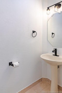 All new, updated, matching hardware and light fixture in 1/2 bath
