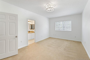 Upgraded ceiling light and fan, new window blinds, and spiffed up bathroom in Master BR