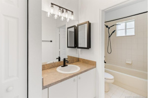 Brand new lighting, medicine cabinet with mirror, towel bar and plumbing hardware in Master Bath, all matching.