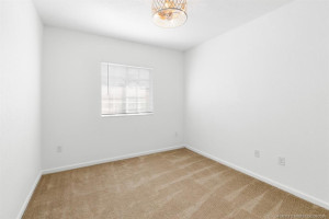 Upgraded ceiling light and fan, new window blinds in BR 2