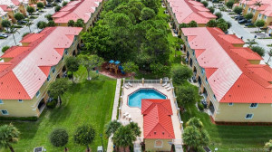 Community Pool between 8-plex rows of townhouses. The property for rent is part of a 4-plex, a nicer situation with less density