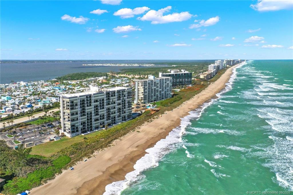 Aerial view of Island Crest and the Hutchinson Island coastline, showcasing its oceanfront location between the Atlantic Ocean and Indian River.