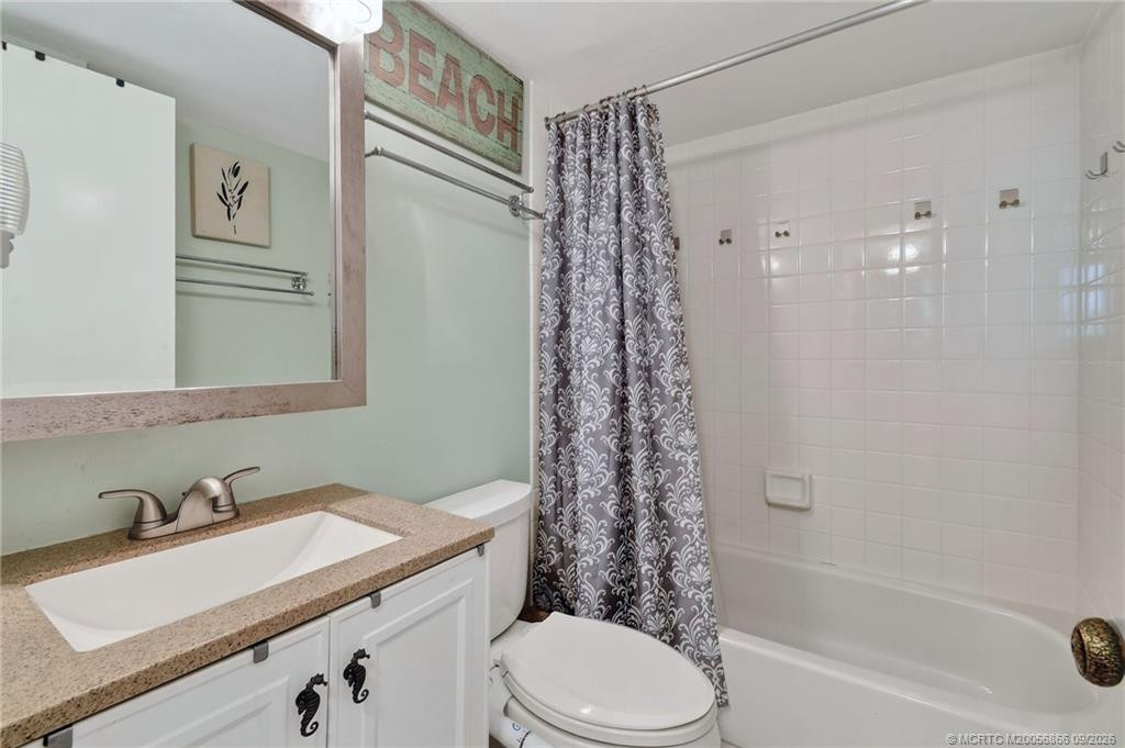 Additional view of the guest bathroom with tub/shower combination.