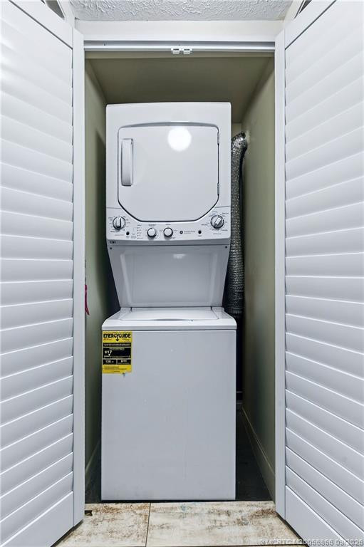 Convenient in-unit laundry with stacked washer and dryer.
