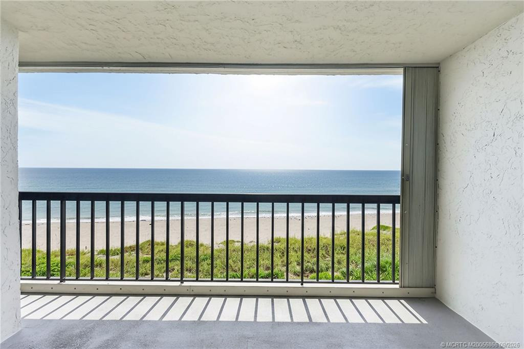 Private oceanfront balcony overlooking the beach with unobstructed Atlantic Ocean views.