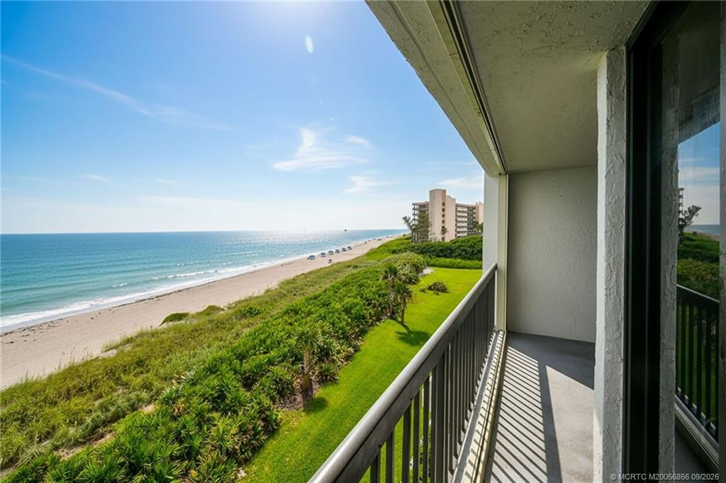 Private oceanfront balcony with sweeping views along the beach and Atlantic Ocean.