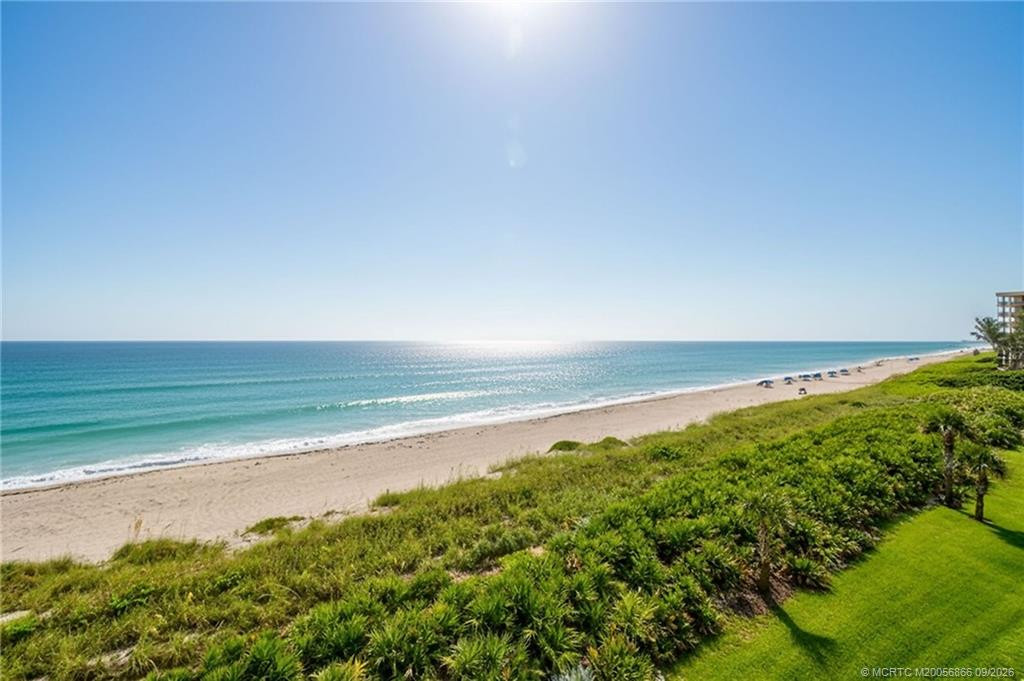Panoramic ocean and coastline views from the unit.