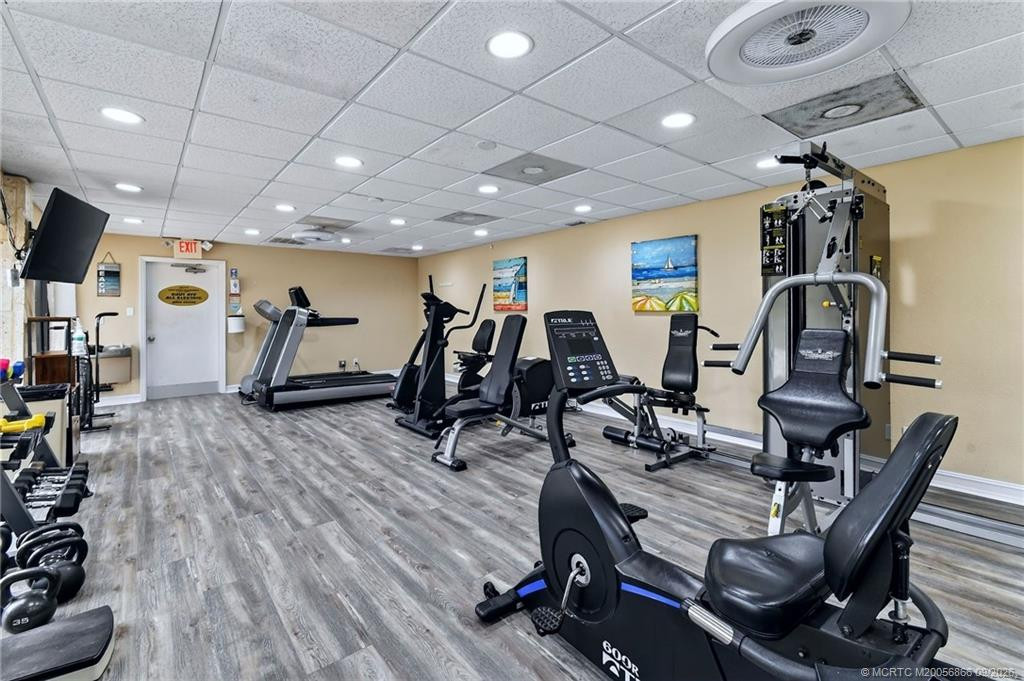 Community fitness center with cardio equipment, strength-training machines and free weights.