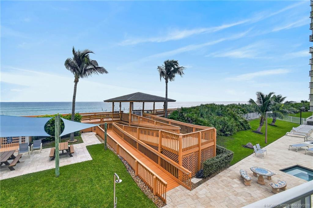 Elevated view of the community’s private beach access and oceanfront pavilion.