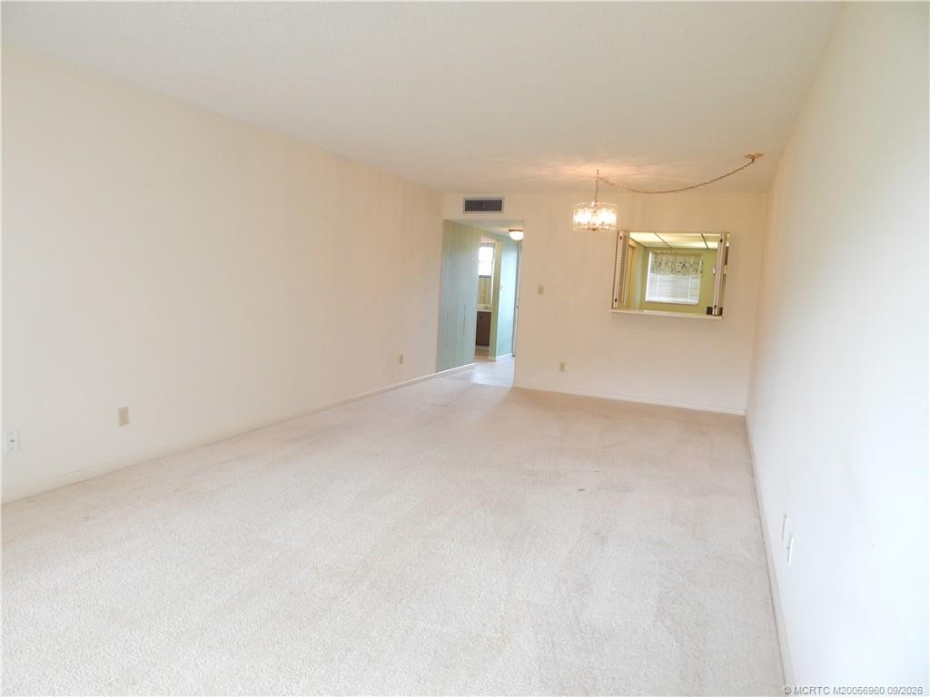 View from Living Room to Kitchen at 175 SE Saint Lucie Boulevard A97, Stuart