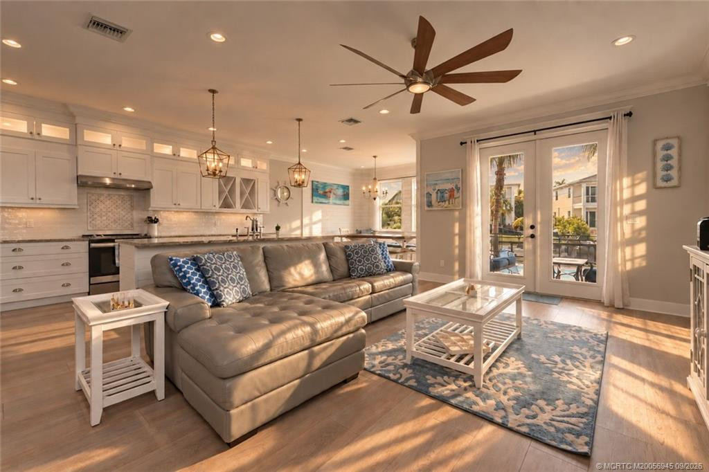 Open Living, Kitchen, and Dining Room, Leading to Private Patio, Pool, Dock, and Canal are the Port Salerno Lifestyle you have been waiting for!