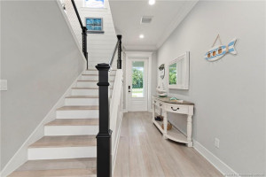 Entry Way with Custom Stair Rail