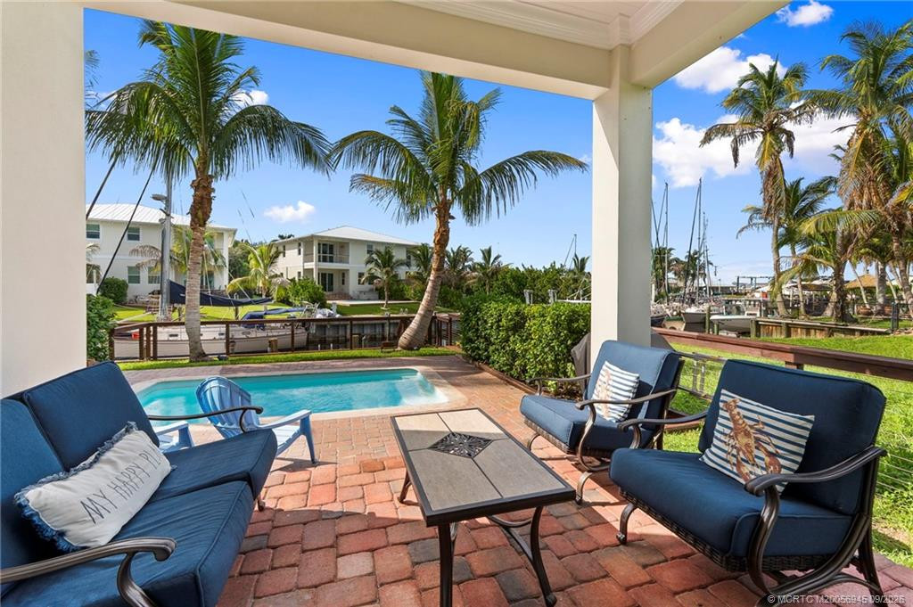 Downstairs Patio overlooking the Pool and Canal