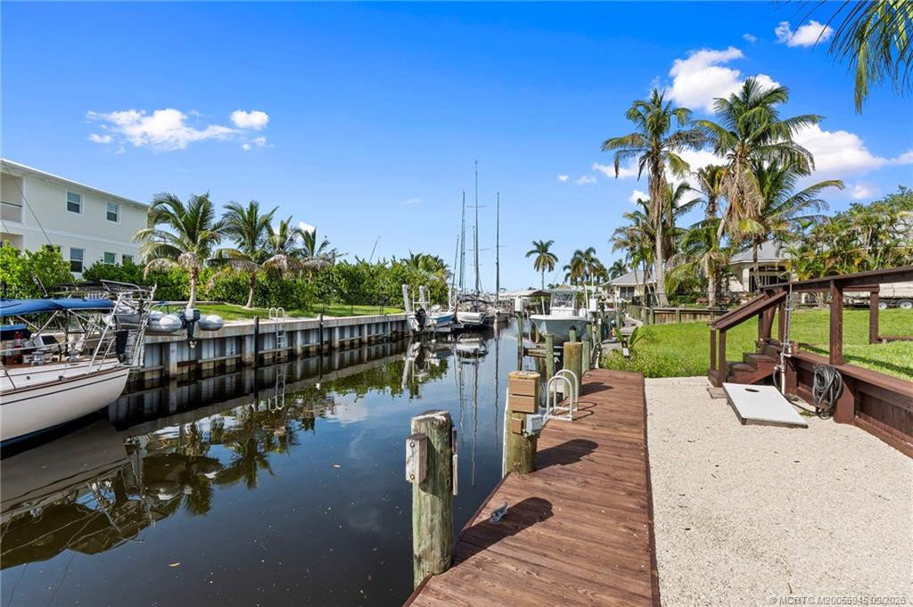 Fully Fenced Back Yard leading to Dock