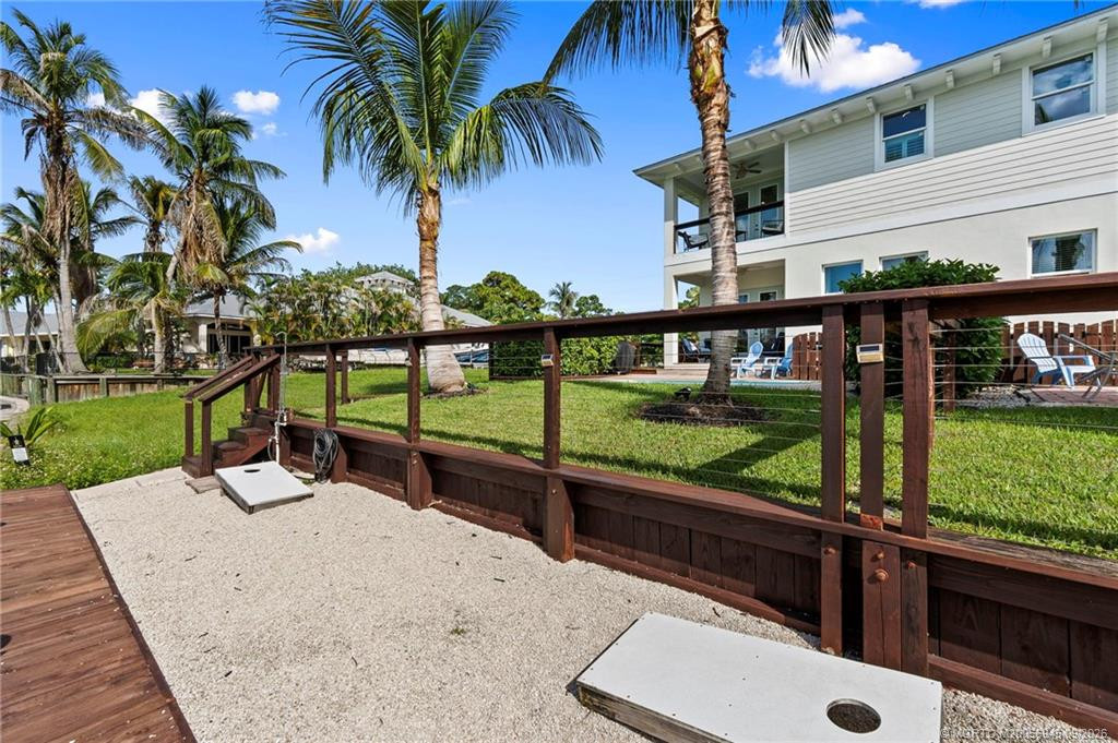 Fully Fenced Back Yard leading to Dock