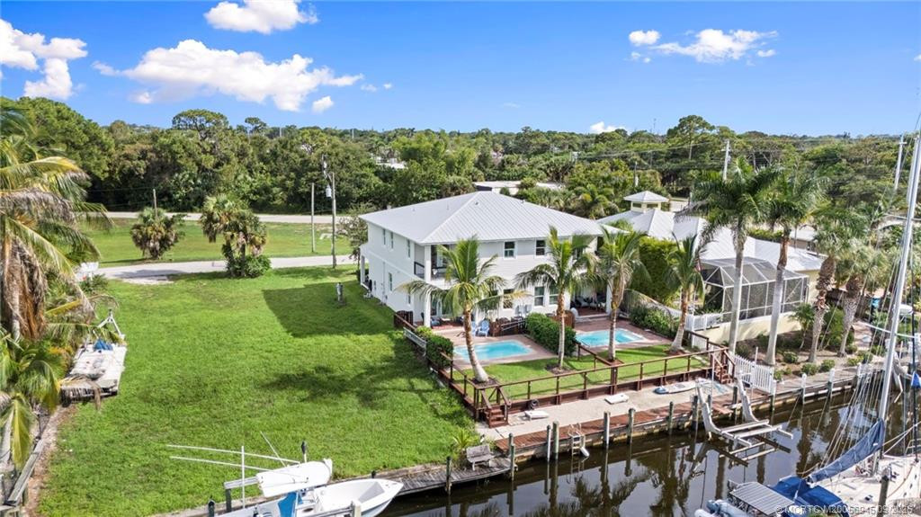 Ariel View of Back of Home and Canal