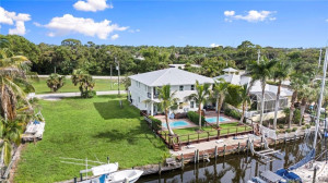 Ariel View of Back of Home and Canal