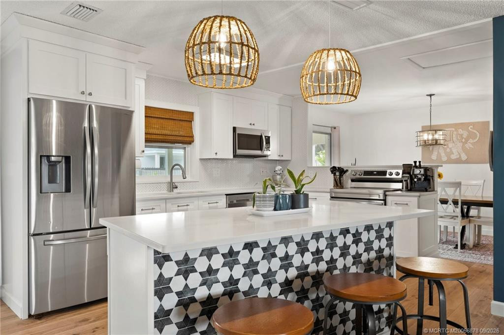 Updated Kitchen and Island at 5906 Papaya Drive, Fort Pierce